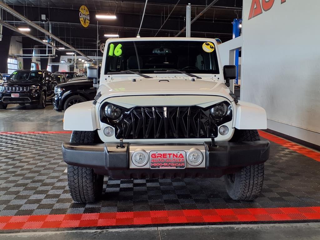 2016 Jeep Wrangler Unlimited Sahara - Bright White exterior view 2