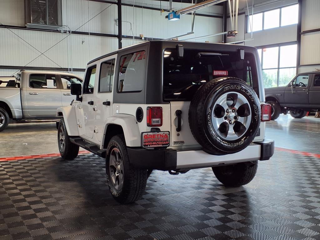 2016 Jeep Wrangler Unlimited Sahara - Bright White exterior view 4