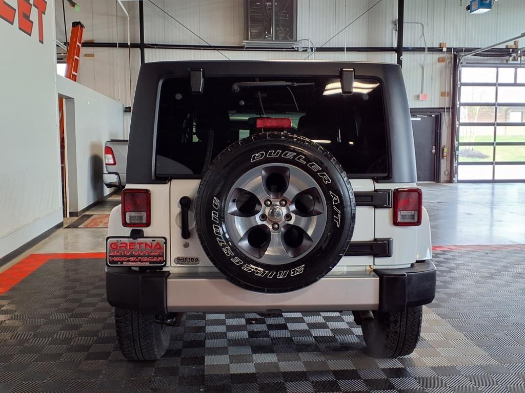 2016 Jeep Wrangler Unlimited Sahara - Bright White exterior view 5