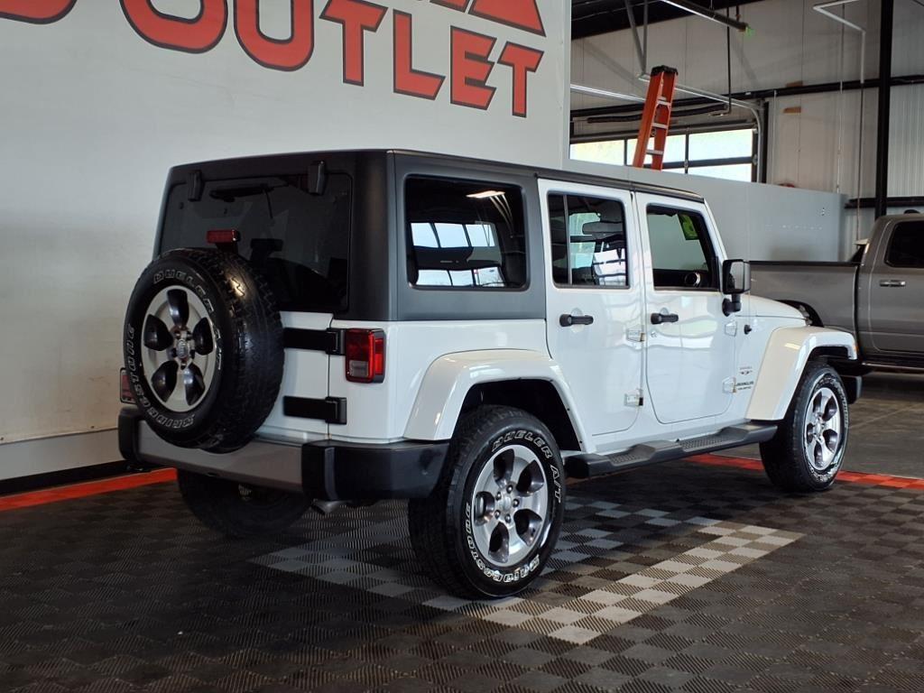2016 Jeep Wrangler Unlimited Sahara - Bright White exterior view 7