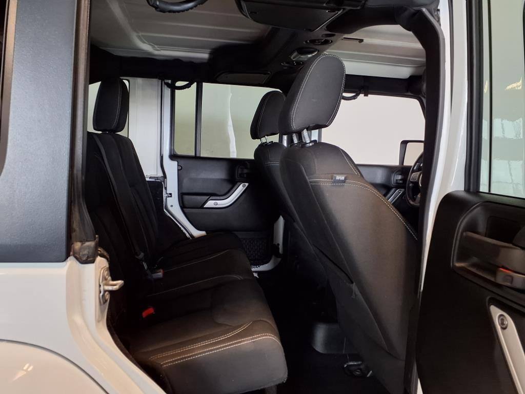 2016 Jeep Wrangler Unlimited Sahara - Bright White exterior view 9