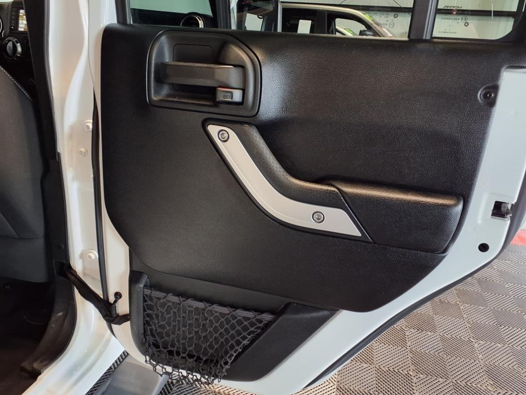 2016 Jeep Wrangler Unlimited Sahara - Bright White exterior view 10