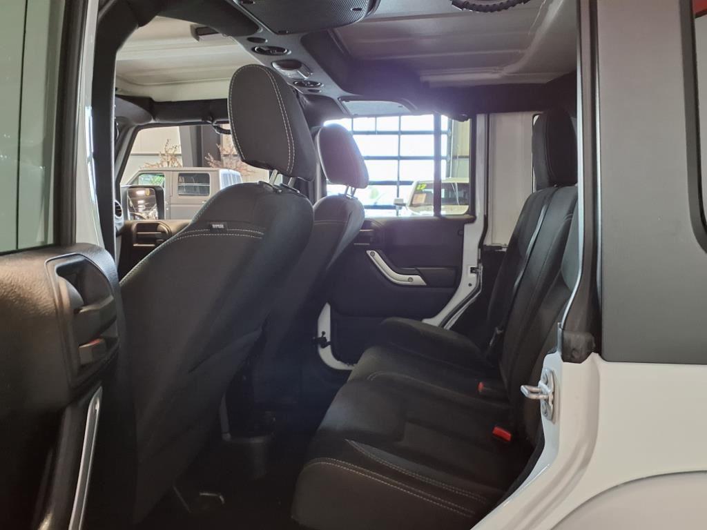 2016 Jeep Wrangler Unlimited Sahara - Bright White exterior view 13