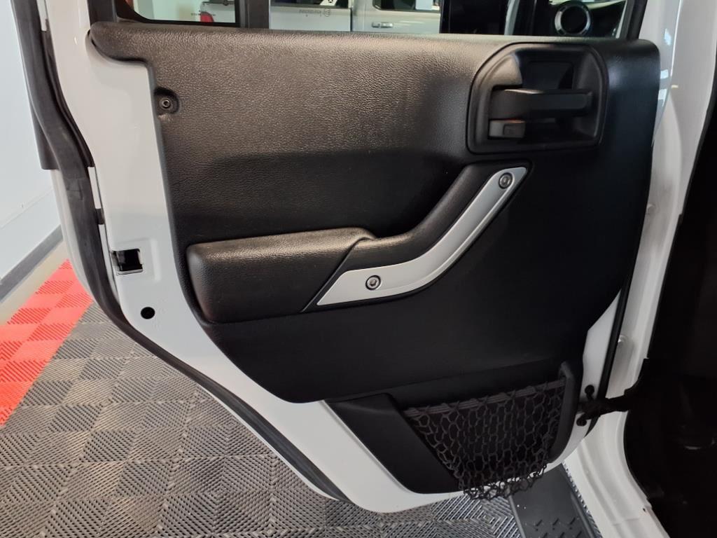 2016 Jeep Wrangler Unlimited Sahara - Bright White exterior view 14