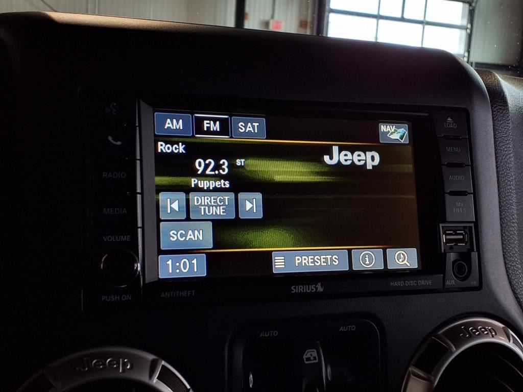 2016 Jeep Wrangler Unlimited Sahara - Bright White exterior view 19