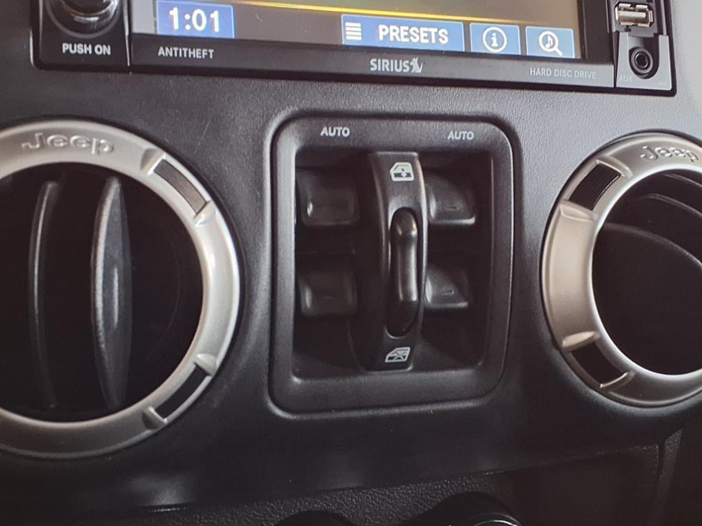 2016 Jeep Wrangler Unlimited Sahara - Bright White exterior view 20