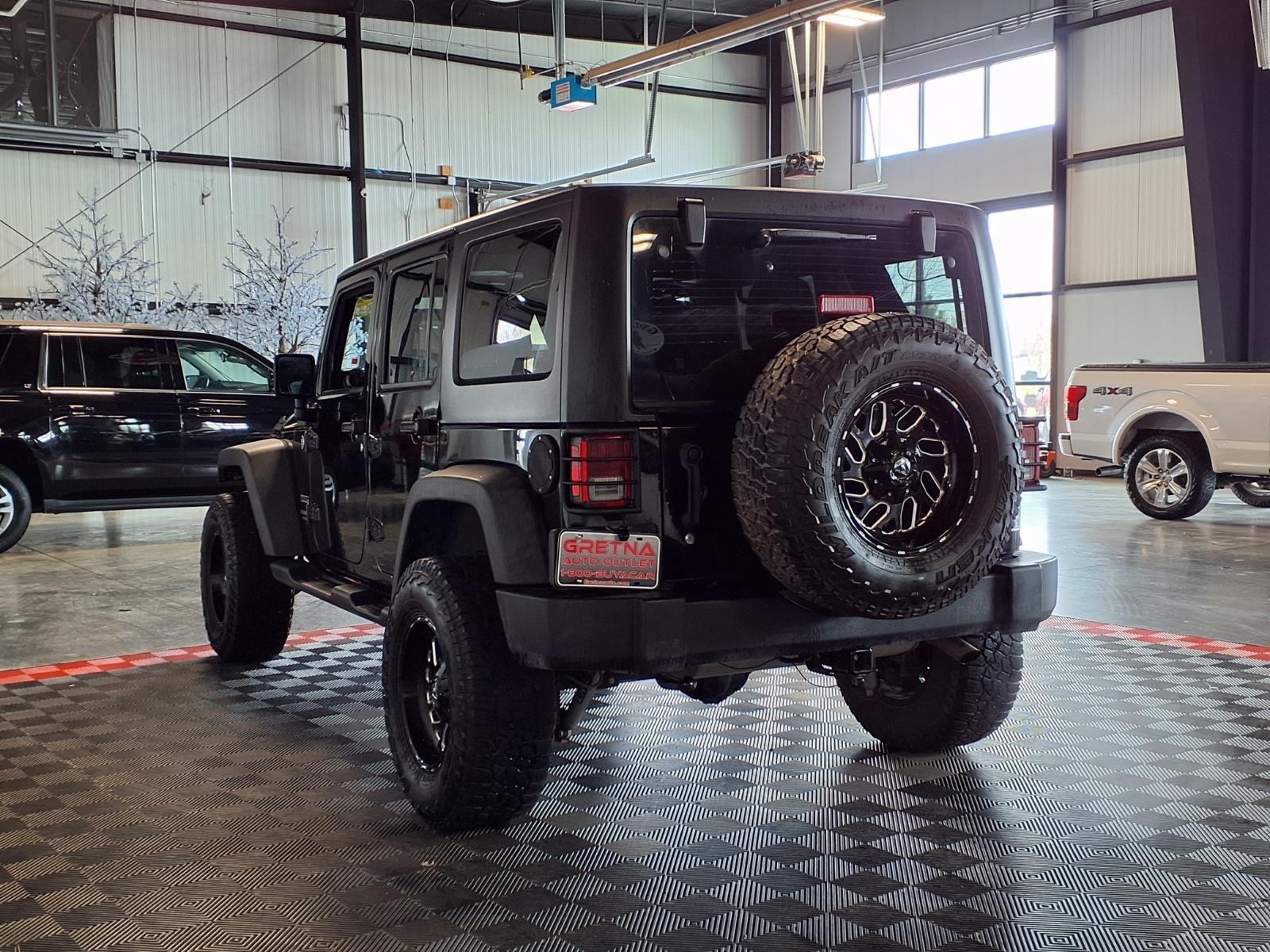 2015 Jeep Wrangler Unlimited Sport - Black Clearcoat exterior view 4
