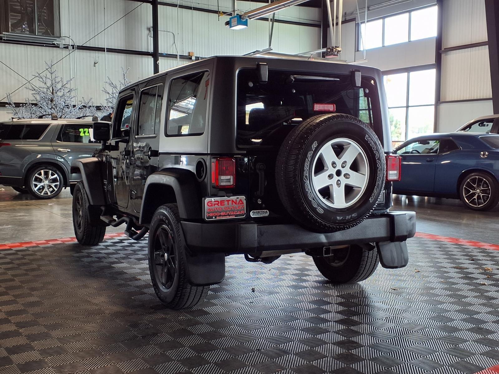 2016 Jeep Wrangler Unlimited Sport - Black Clearcoat exterior view 4