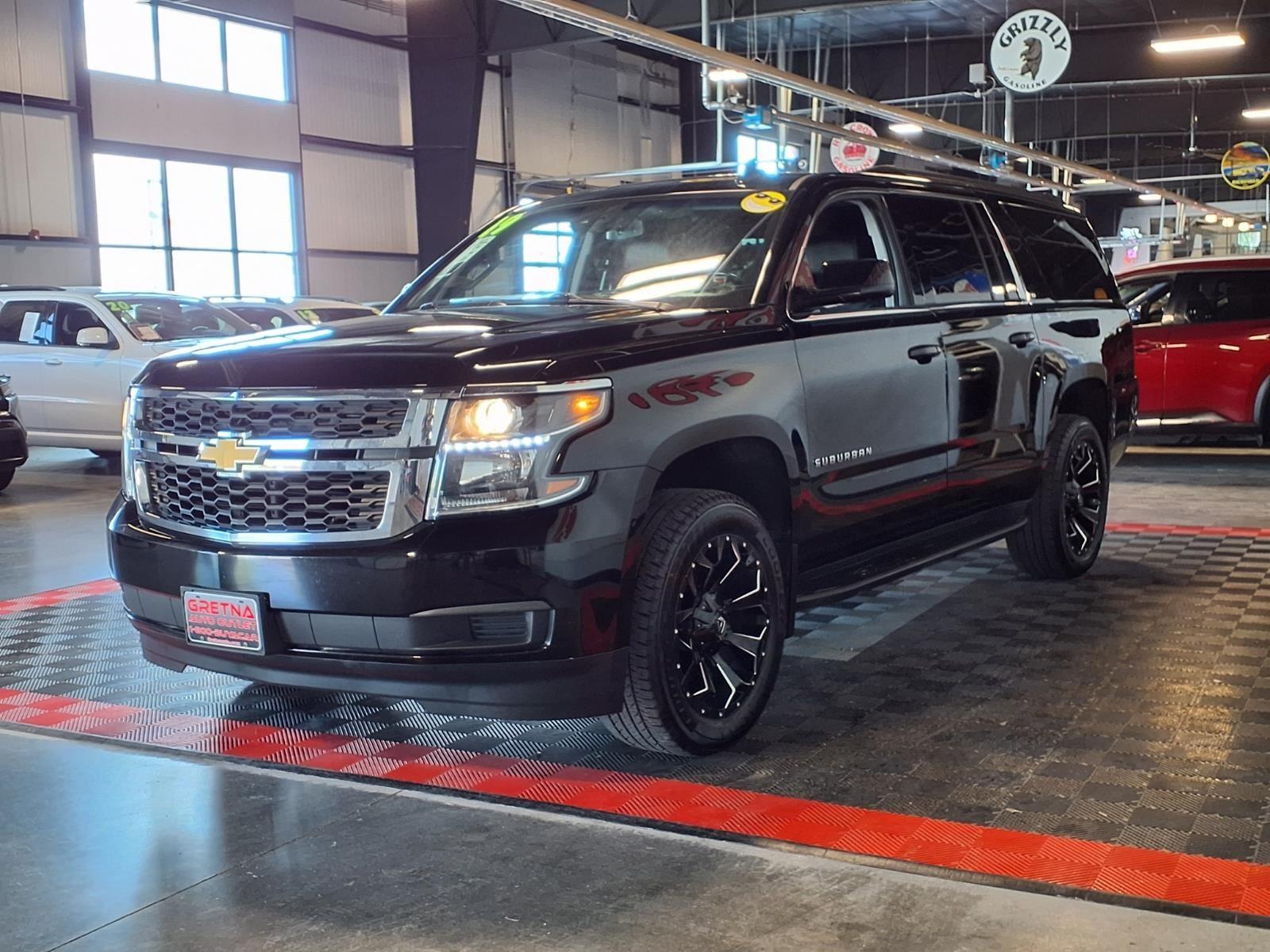 2019 Chevrolet Suburban LT - Black exterior view 3