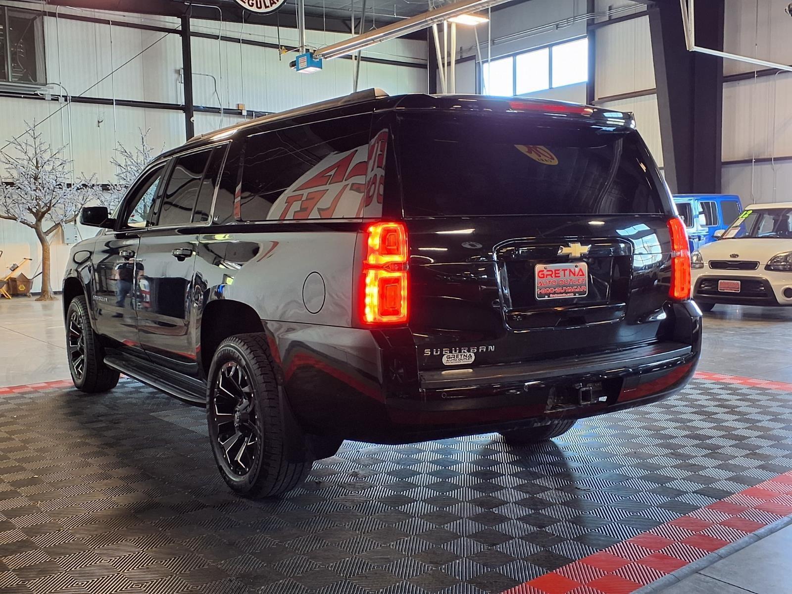 2019 Chevrolet Suburban LT - Black exterior view 4