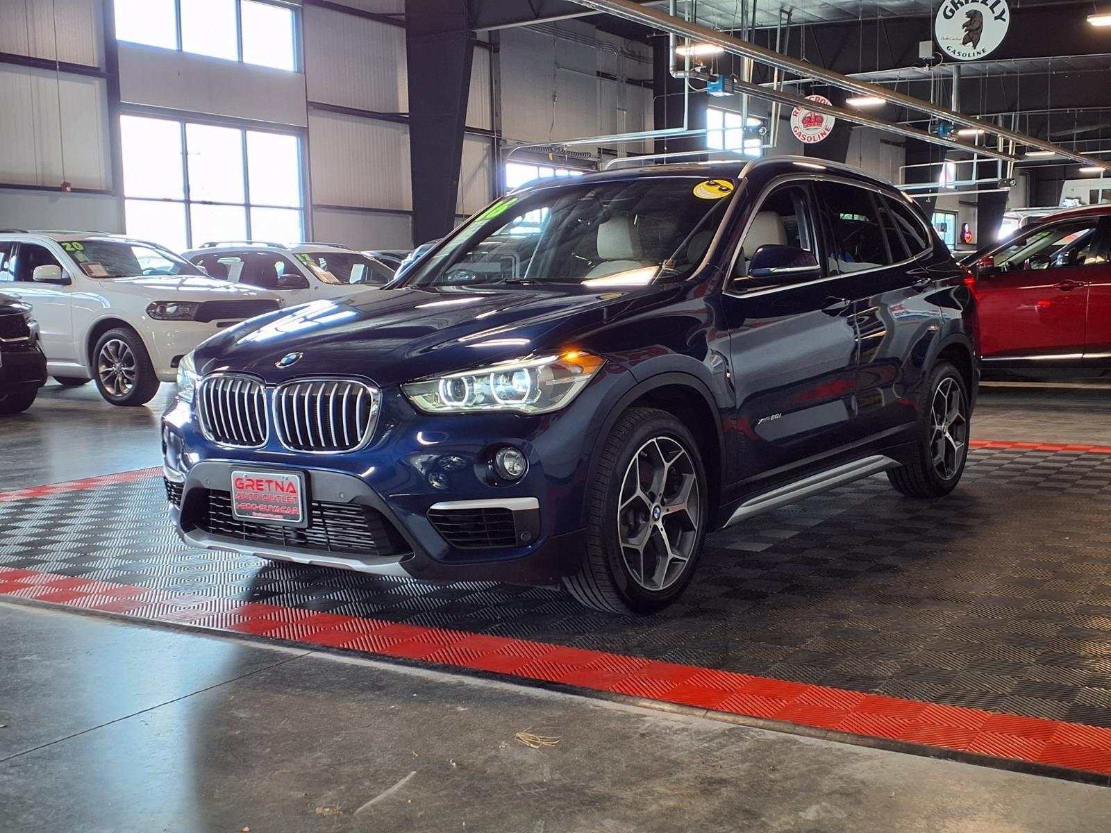 2016 BMW X1 xDrive28i - Mediterranean Blue Metallic exterior view 3