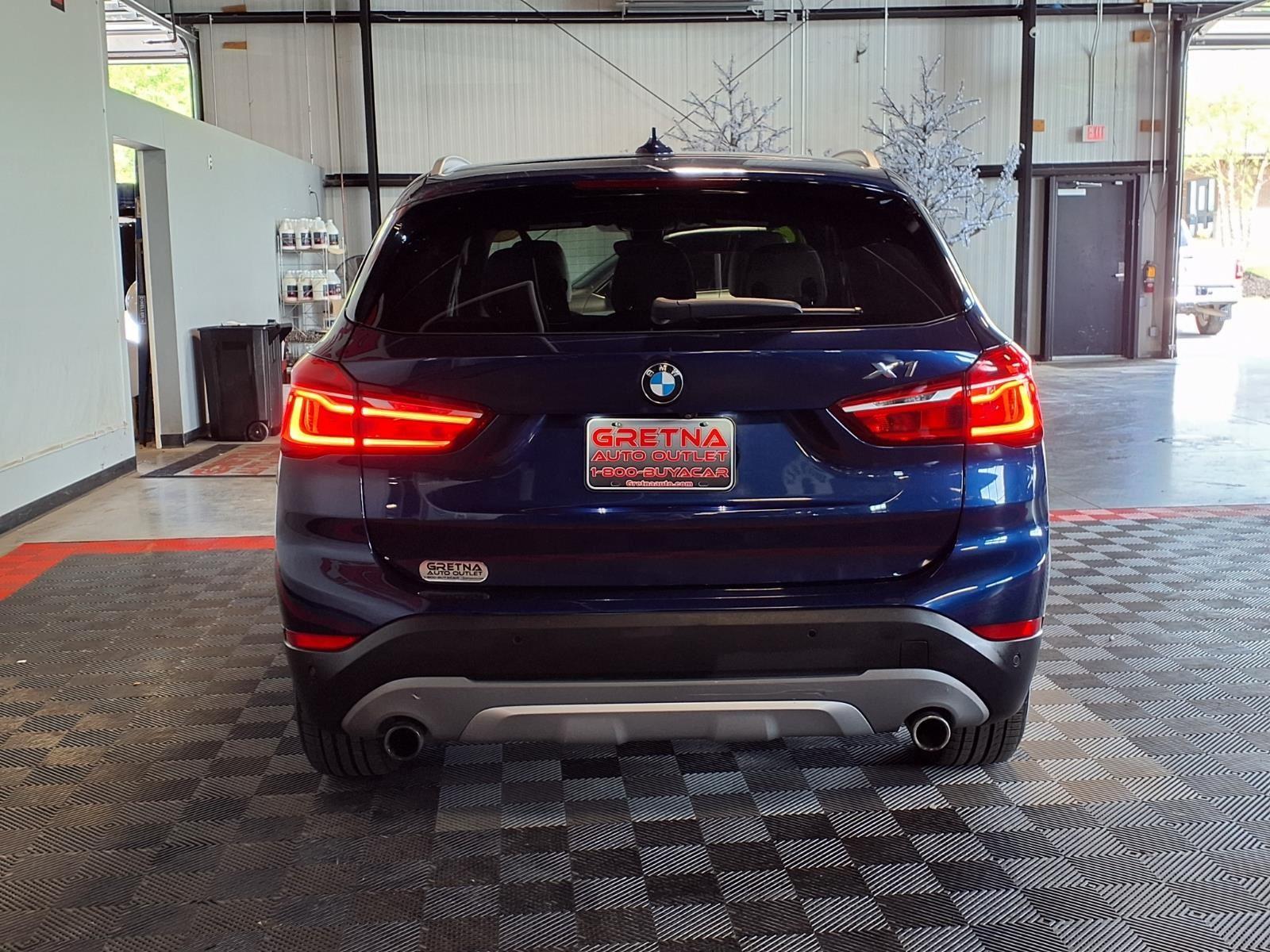 2016 BMW X1 xDrive28i - Mediterranean Blue Metallic exterior view 5