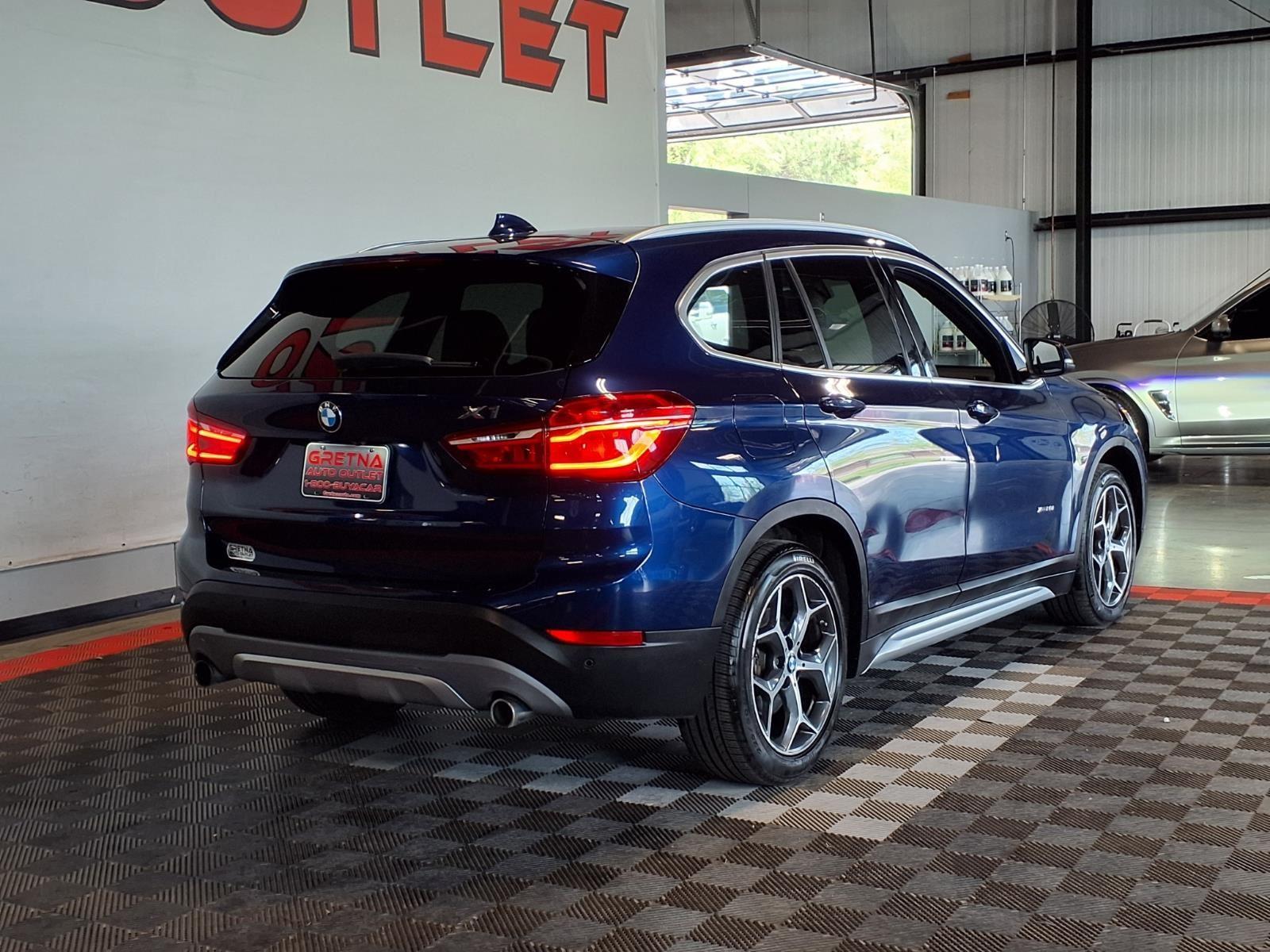 2016 BMW X1 xDrive28i - Mediterranean Blue Metallic exterior view 8