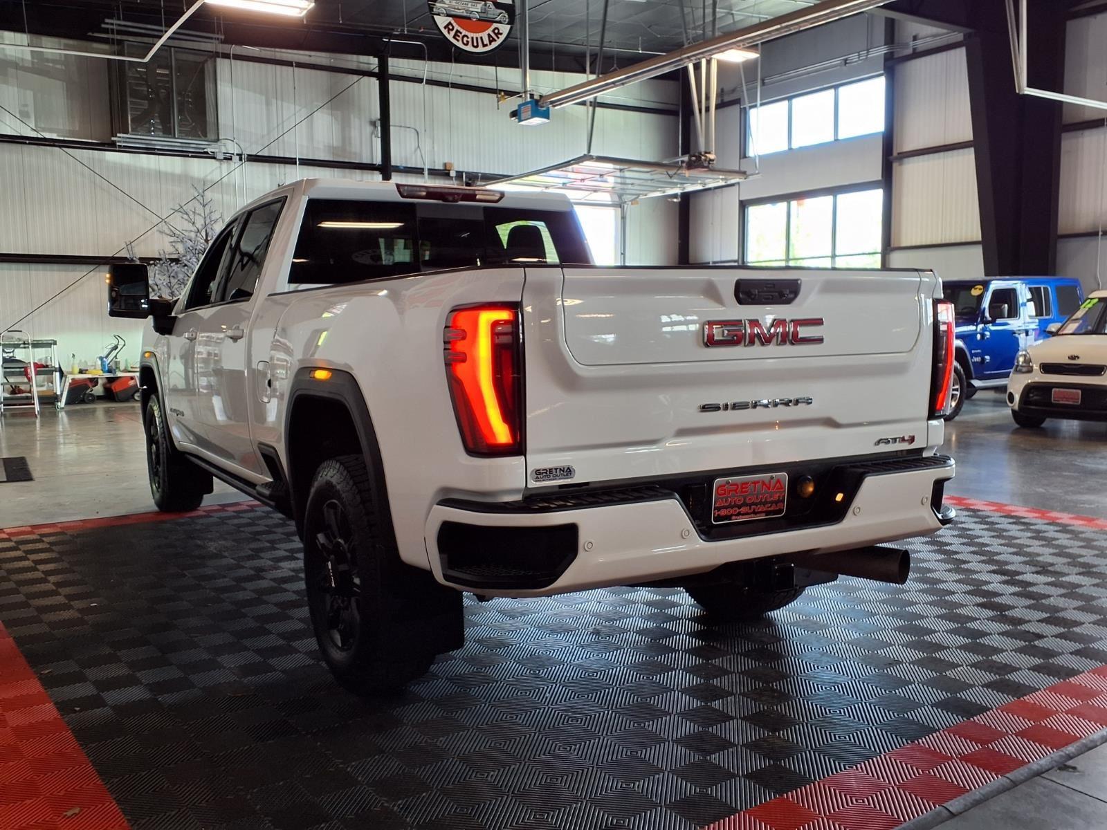 2024 GMC Sierra 2500HD AT4 - Summit White exterior view 4