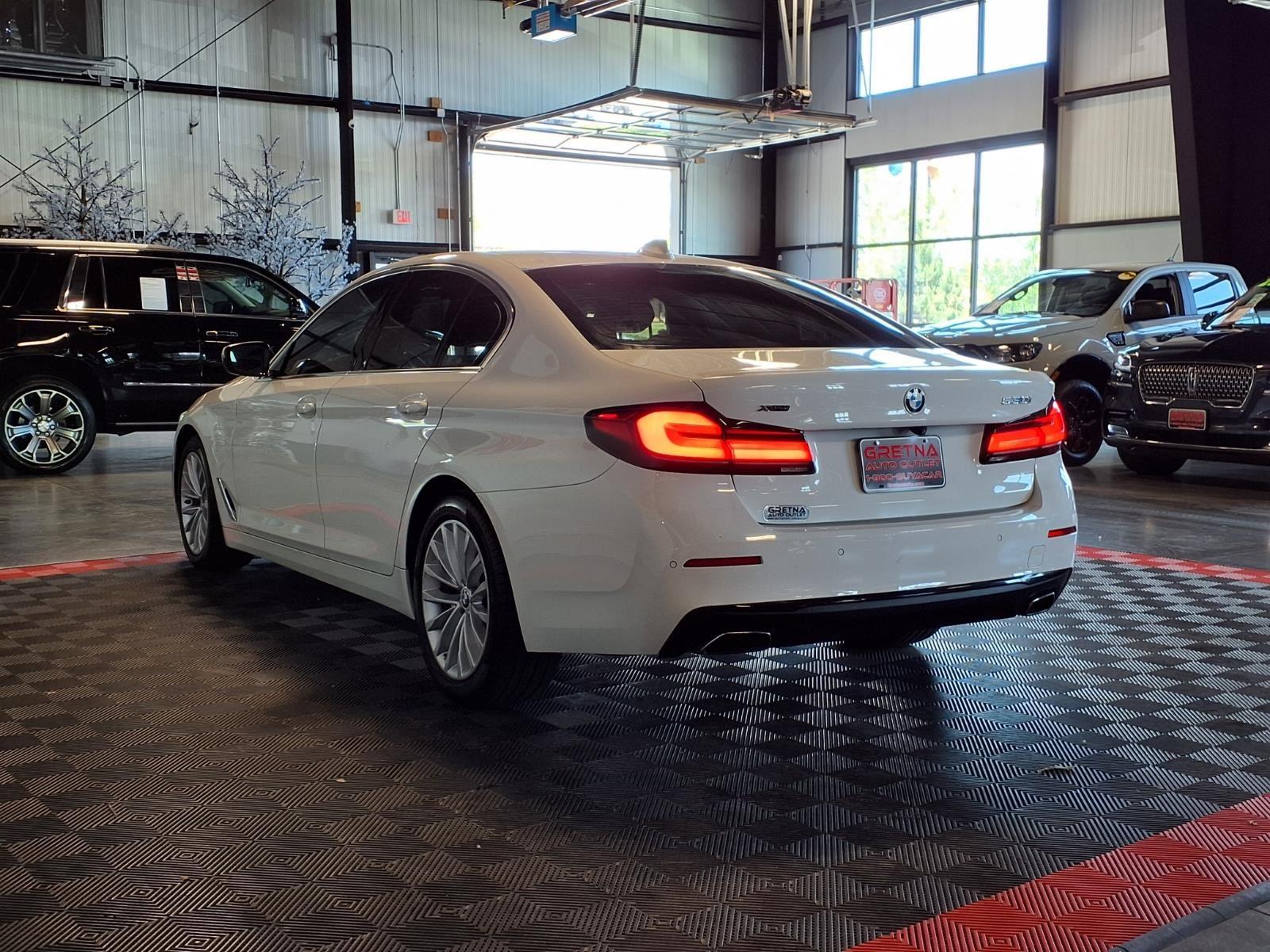 2021 BMW 5 Series 530i xDrive - Alpine White exterior view 4