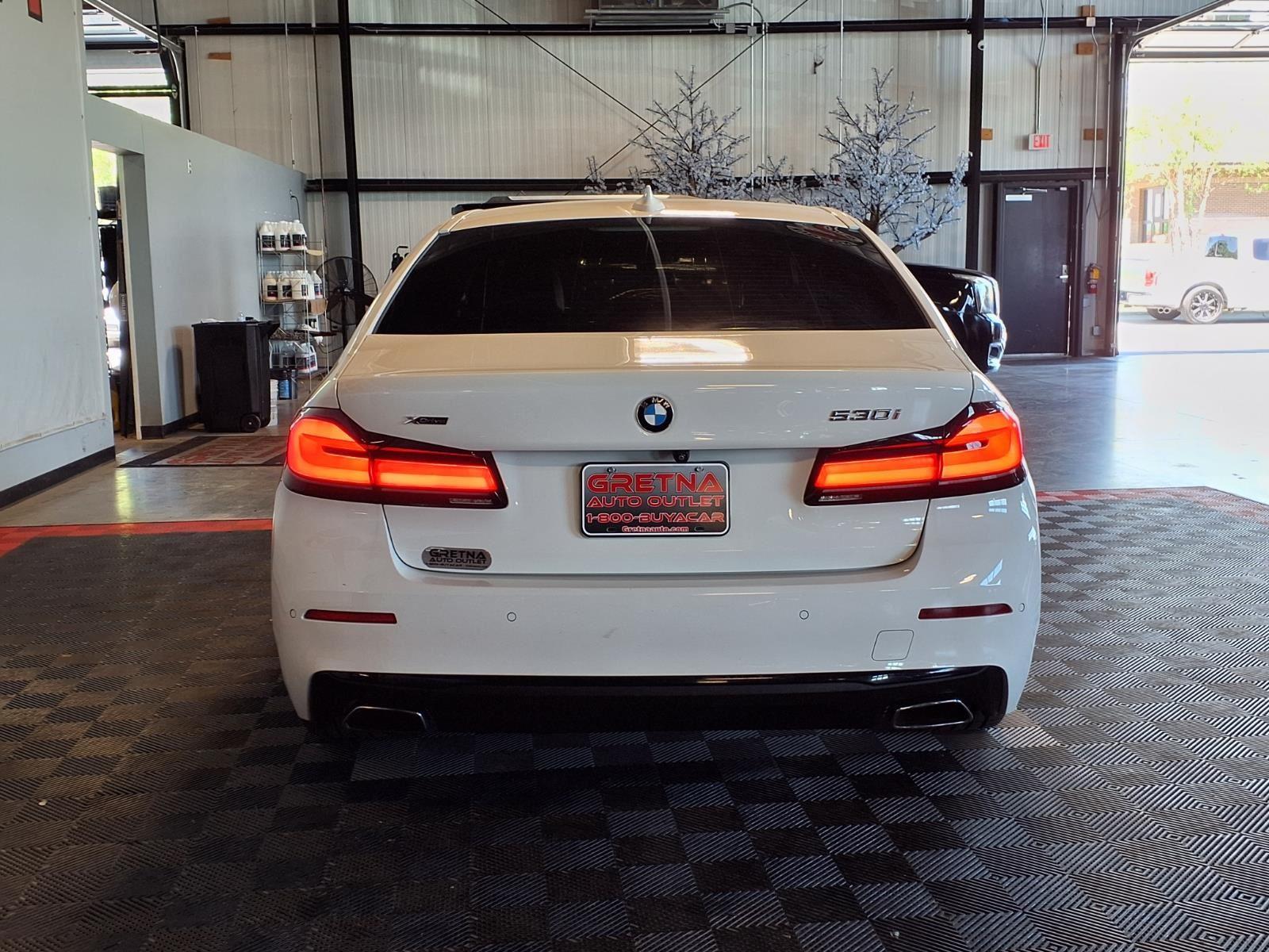 2021 BMW 5 Series 530i xDrive - Alpine White exterior view 5