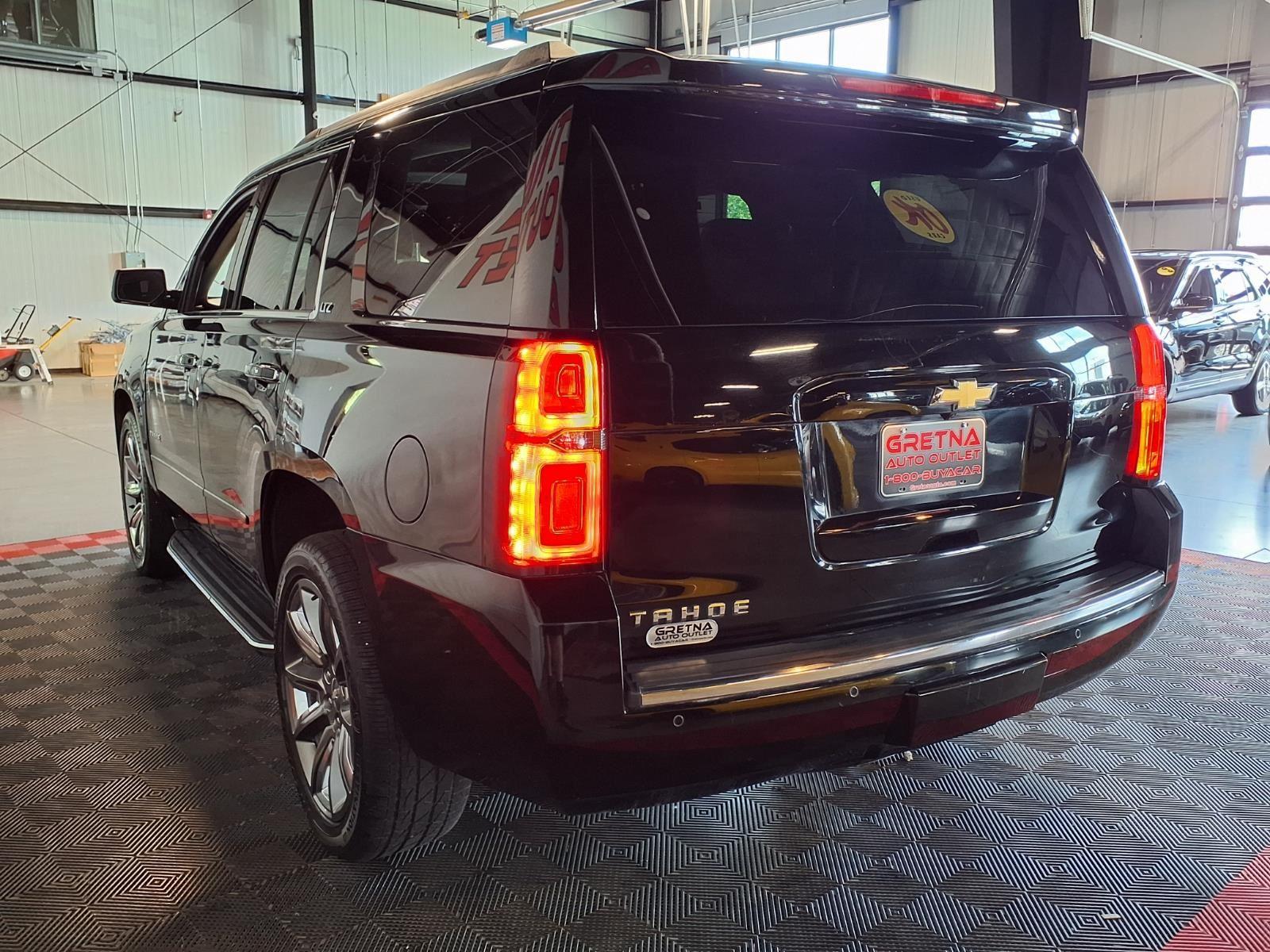 2016 Chevrolet Tahoe LTZ - Black exterior view 5