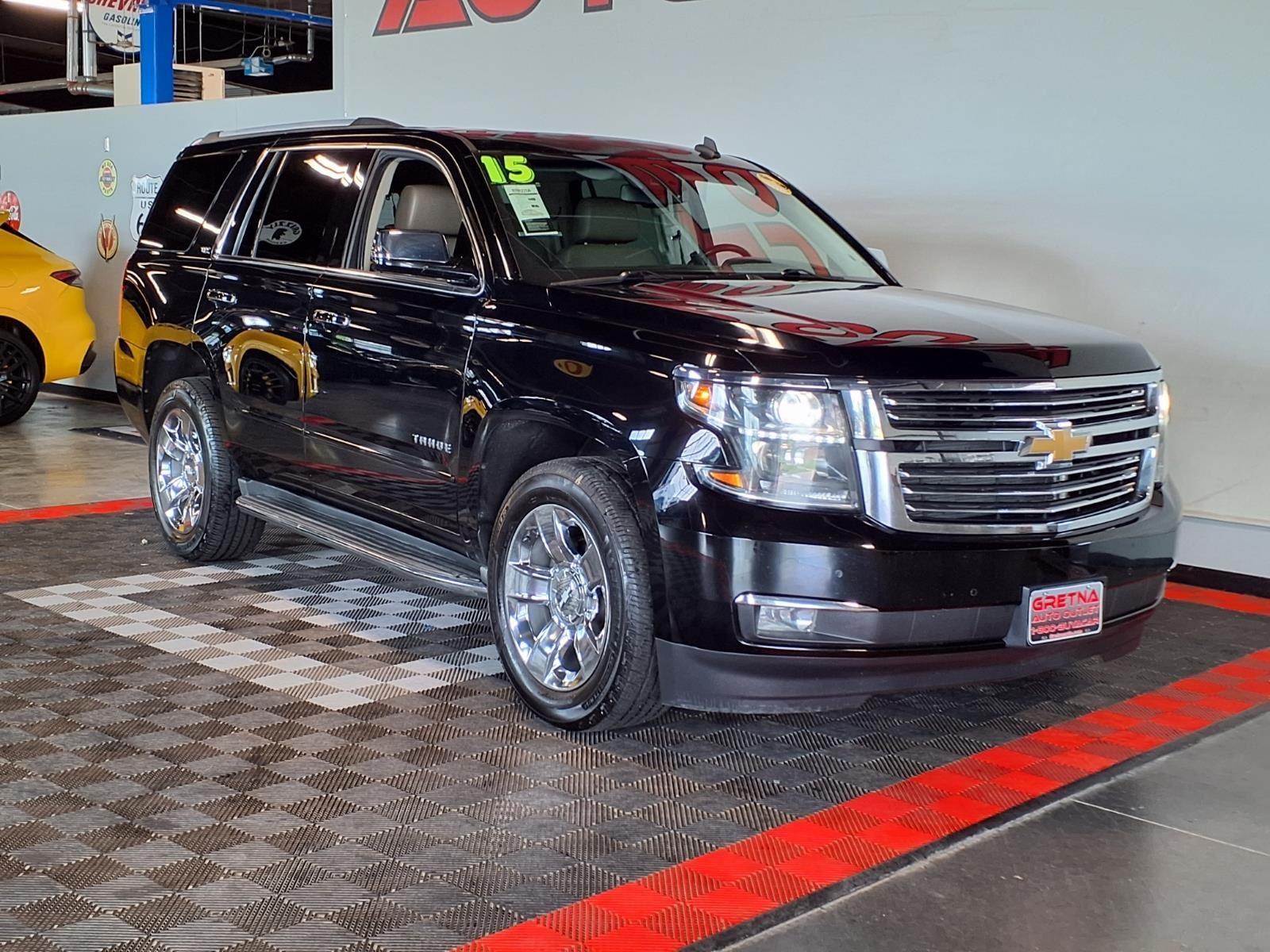 2015 Chevrolet Tahoe LTZ - Black exterior view 2