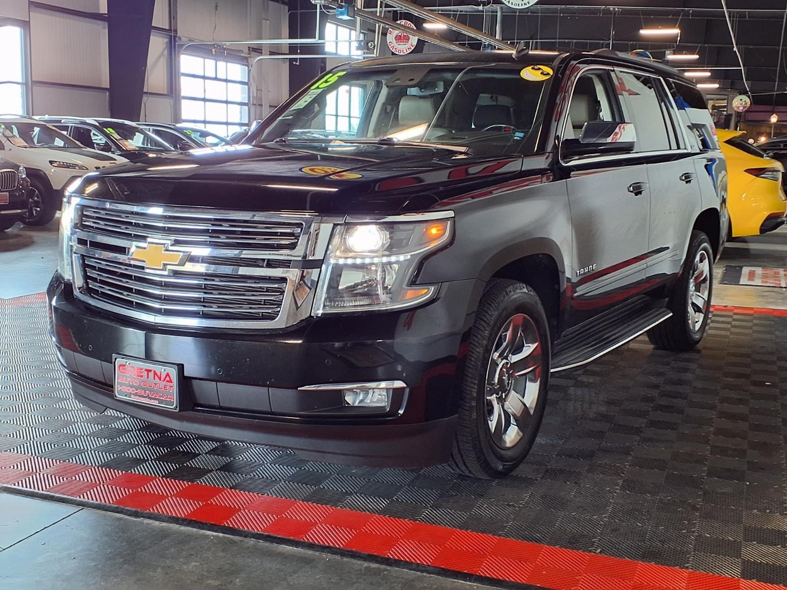 2015 Chevrolet Tahoe LTZ - Black exterior view 4