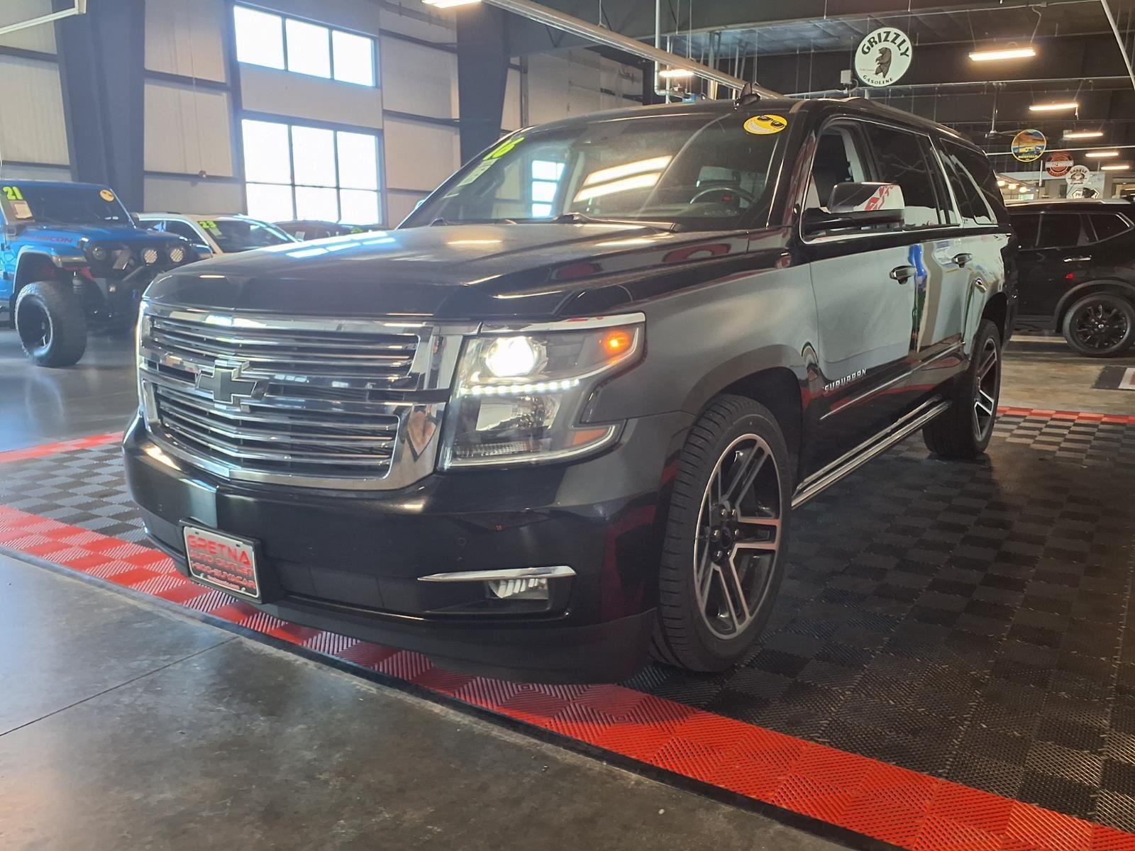 2016 Chevrolet Suburban LTZ - Black exterior view 4