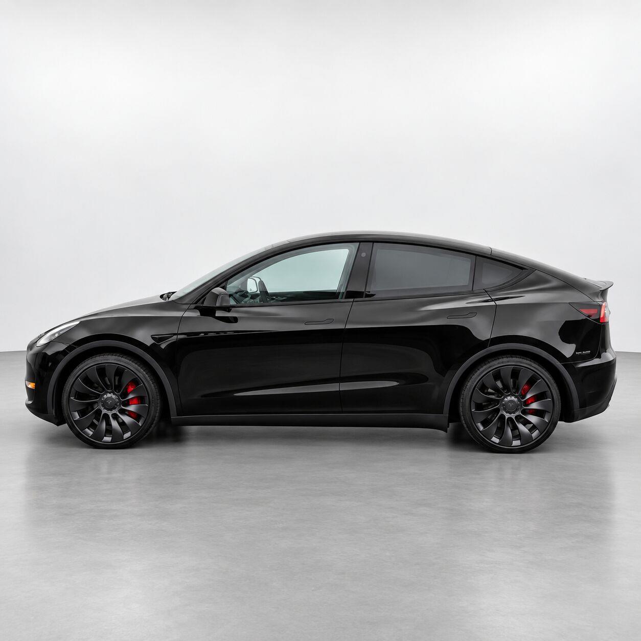 Used 2022 Solid Black Tesla Performance image 2