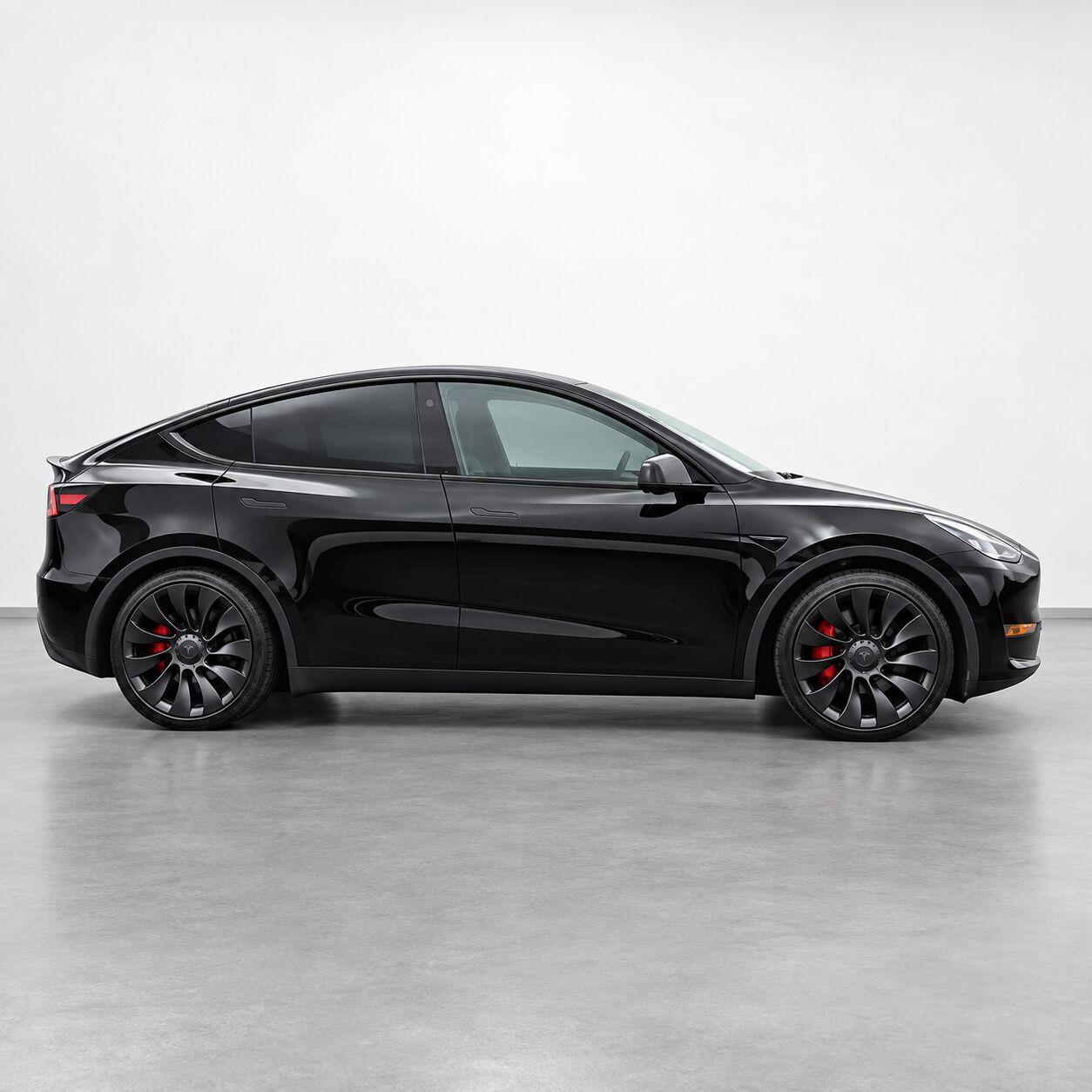 Used 2022 Solid Black Tesla Performance image 6