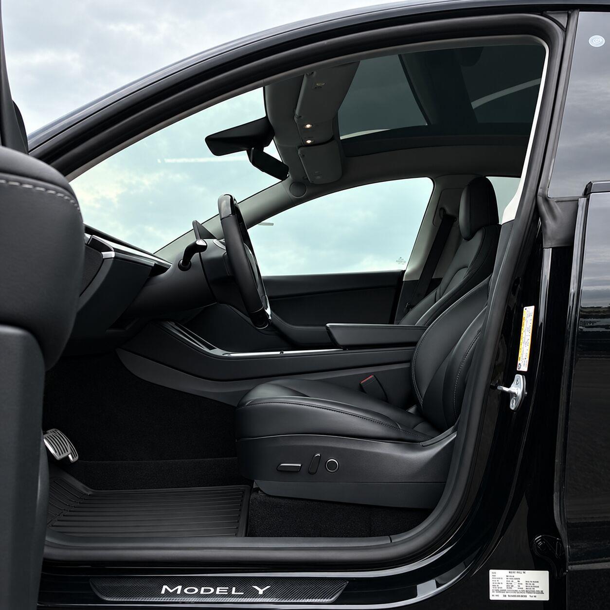 Used 2022 Solid Black Tesla Performance image 10