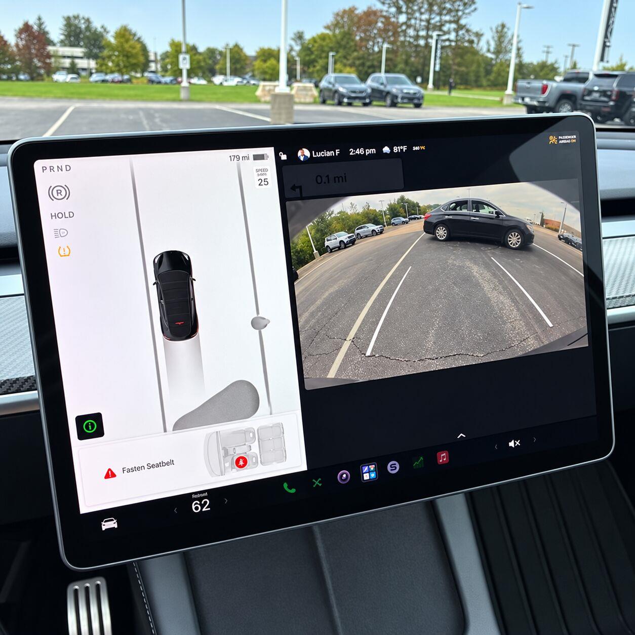 Used 2022 Solid Black Tesla Performance image 16