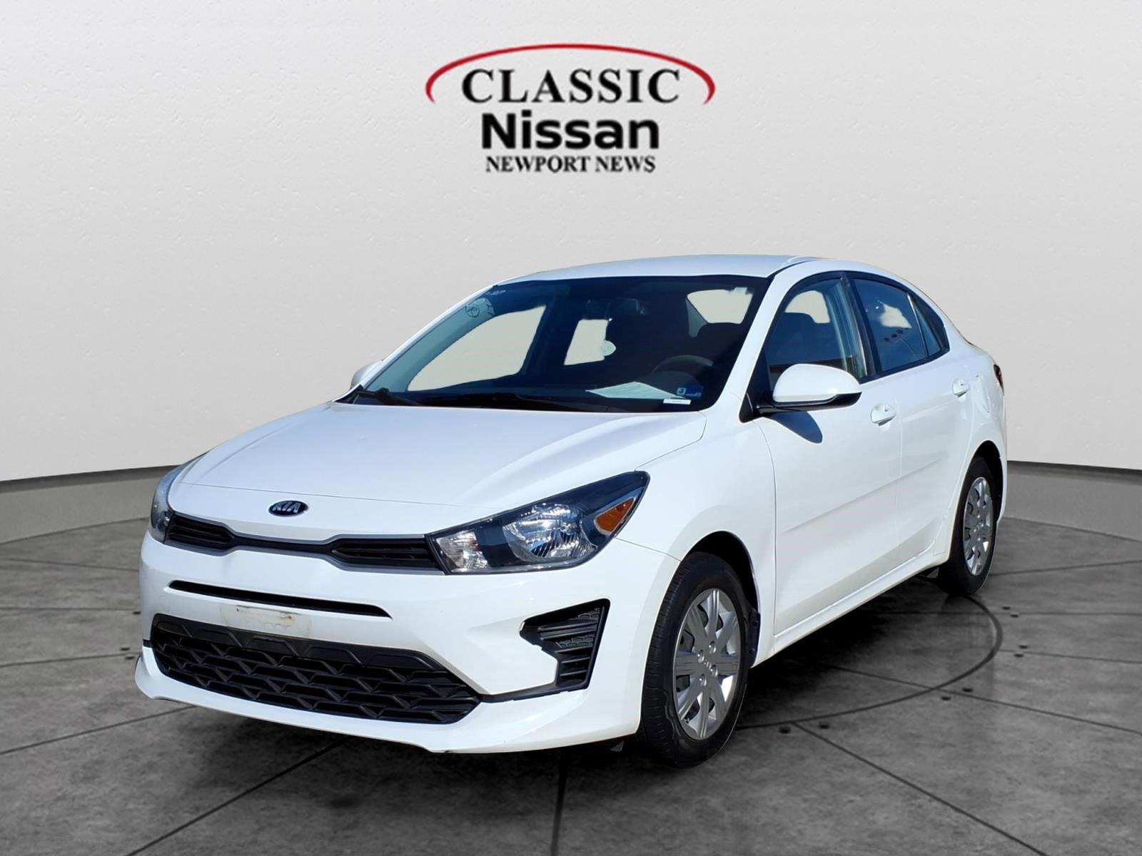 Clear White 2021 Kia Rio Sedan Front-Wheel Drive Continuously Variable Transmission