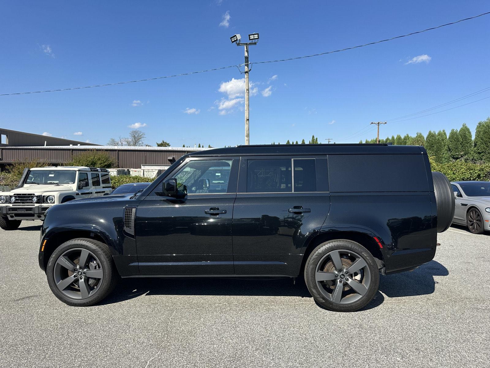 Used 2024 Santorini Black Metallic Land Rover Outbound image 2