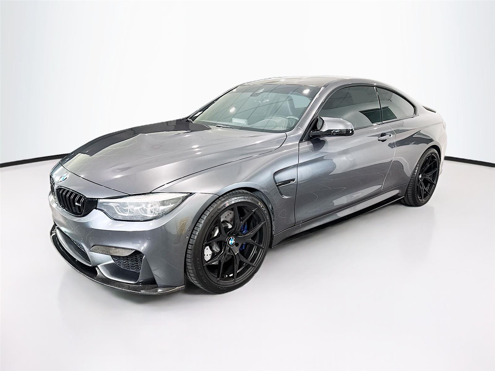 Mineral Gray Metallic 2019 BMW M4 Coupe RWD Coupe Rear-Wheel Drive 7-Speed Automatic