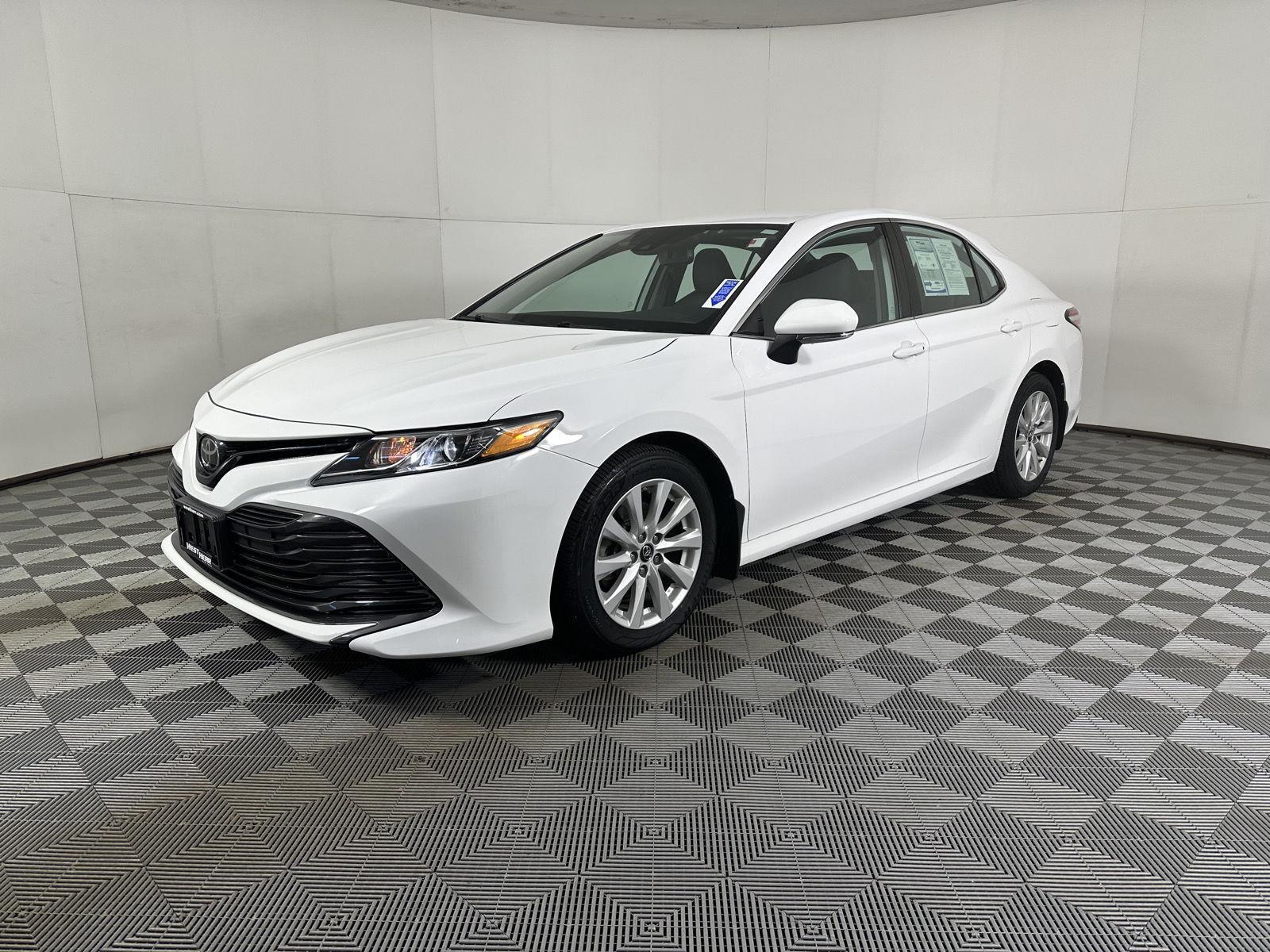 Used 2019 Super White Toyota LE image 11