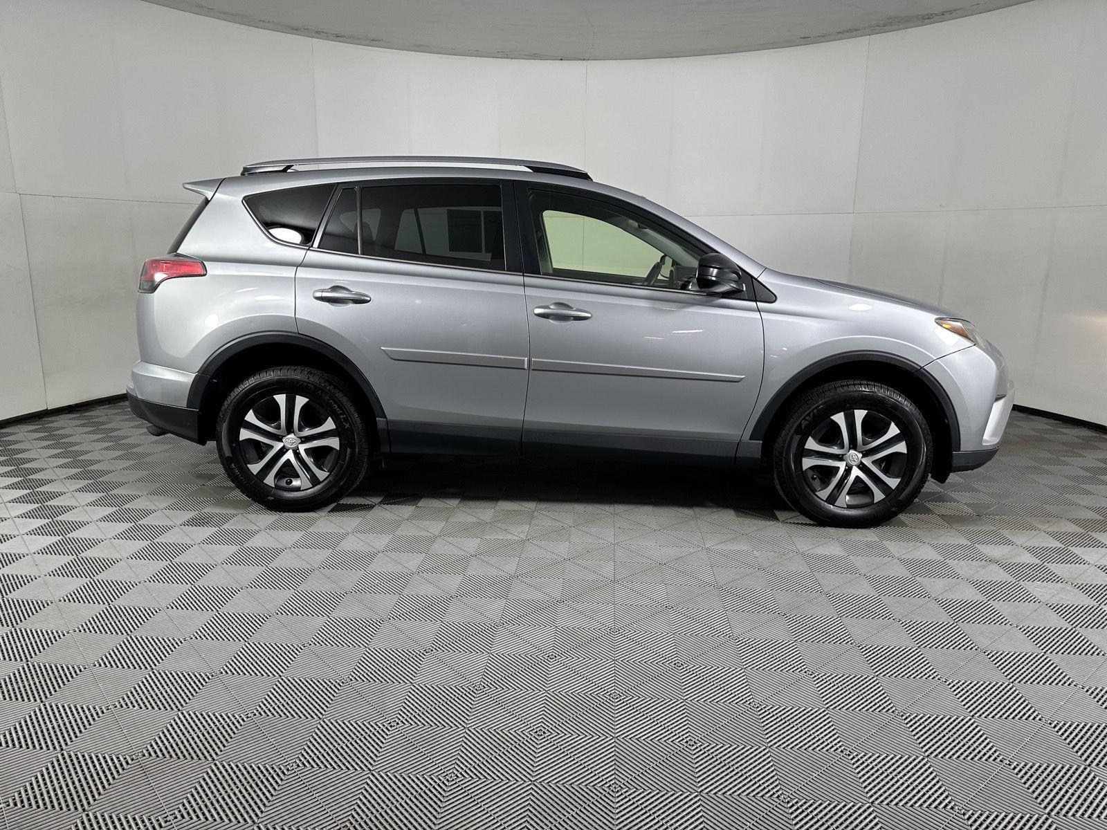 Used 2018 Silver Sky Metallic Toyota LE image 13