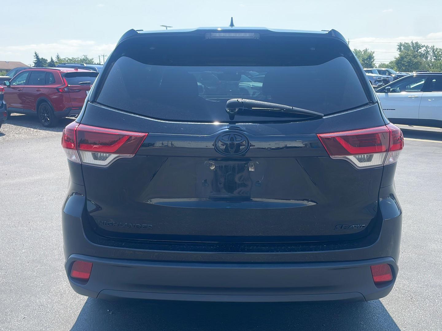 Used 2019 Midnight Black Metallic Toyota SE image 12