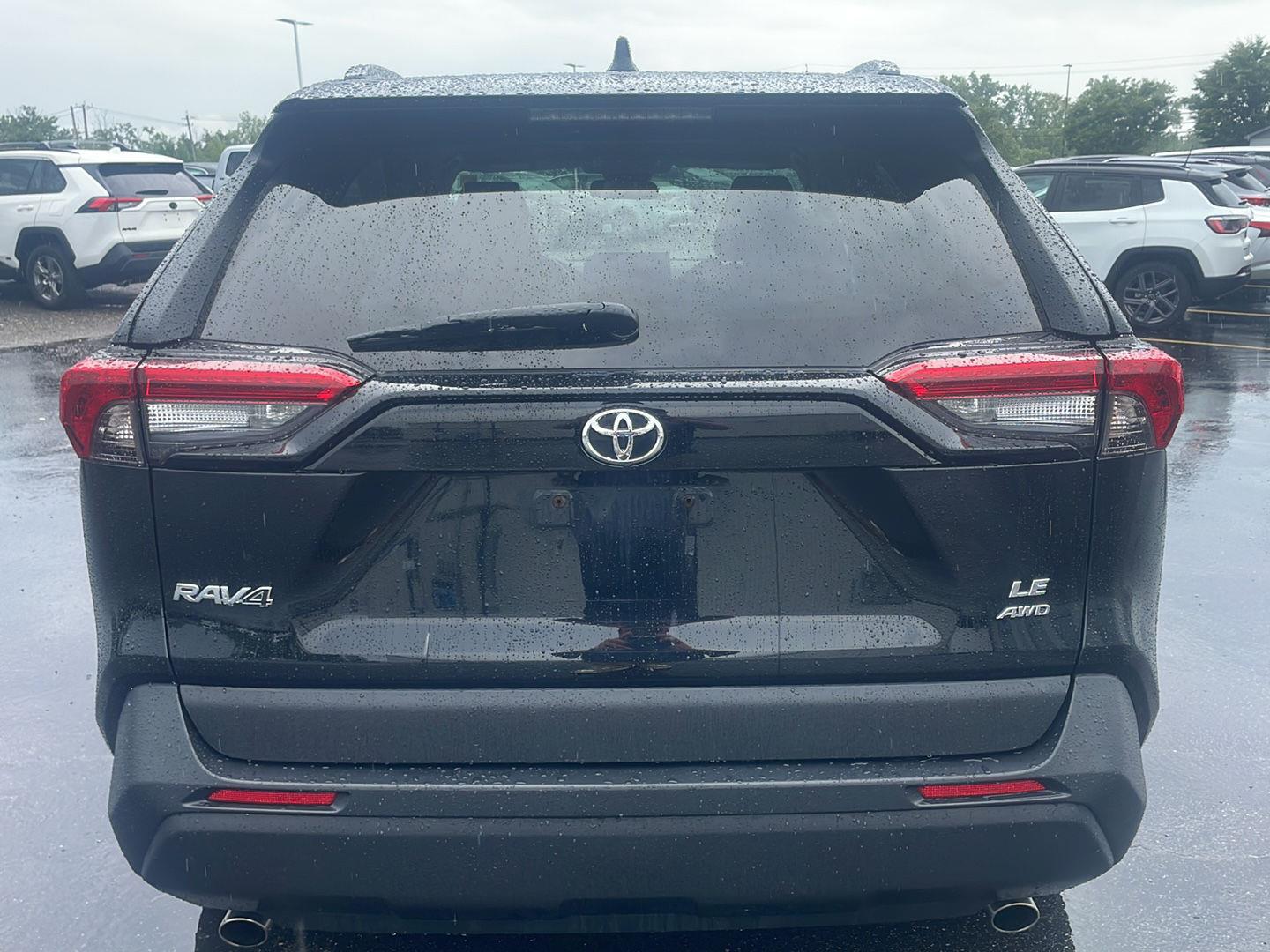 Used 2021 Midnight Black Metallic Toyota LE image 13