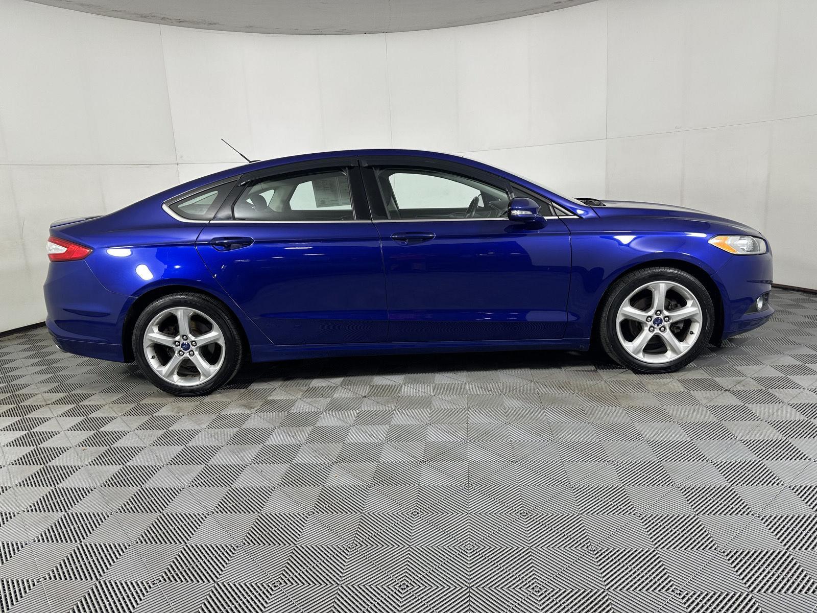 Used 2016 Deep Impact Blue Ford SE image 13