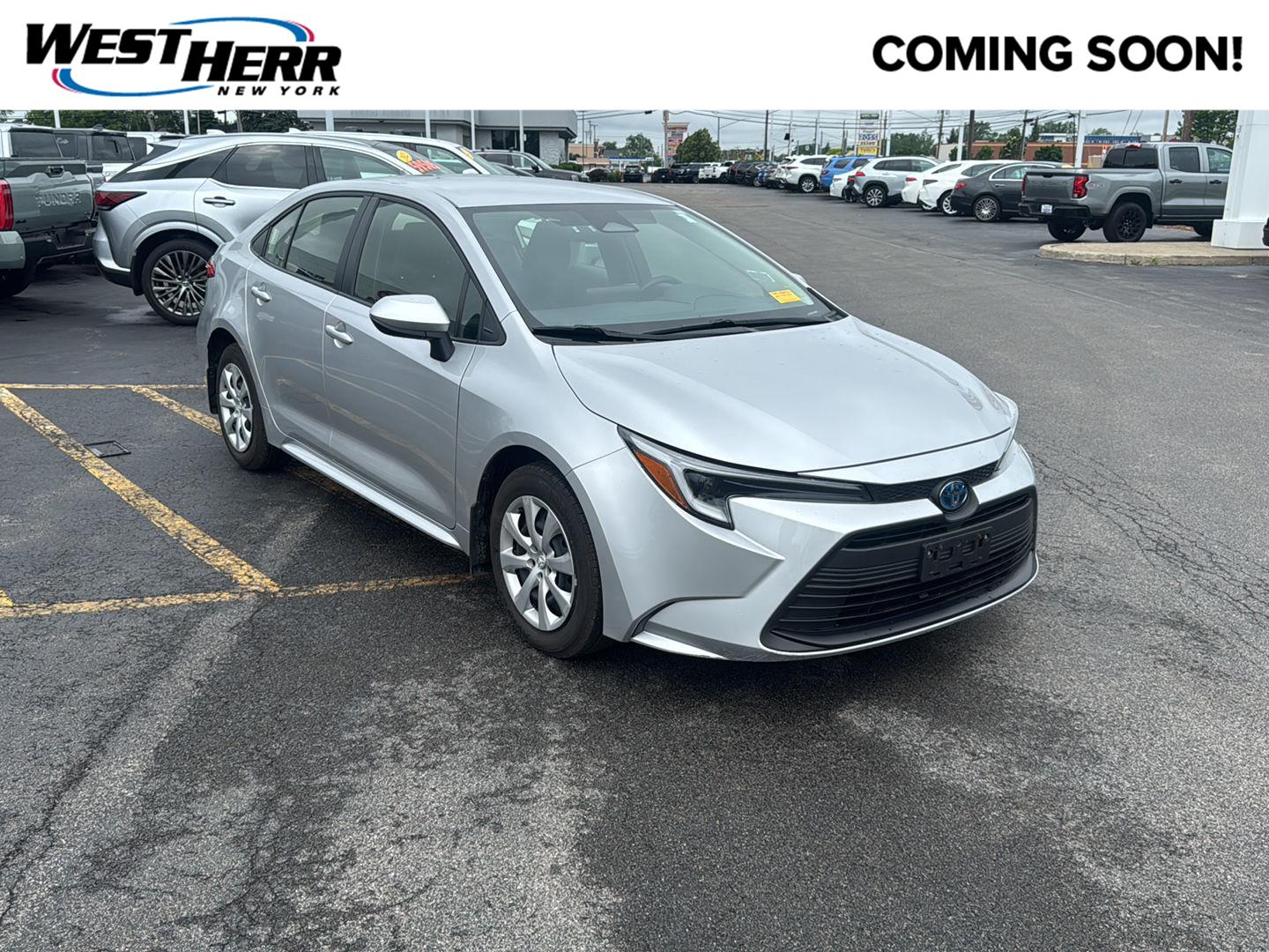 Classic Silver Metallic 2024 Toyota Corolla Hybrid LE FWD Sedan Front-Wheel Drive Continuously Variable Transmission