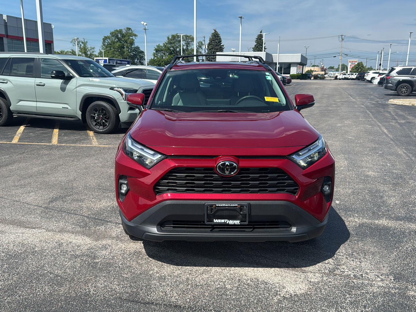 Certified Used 2024 Ruby Flare Pearl Toyota XLE Premium image 2