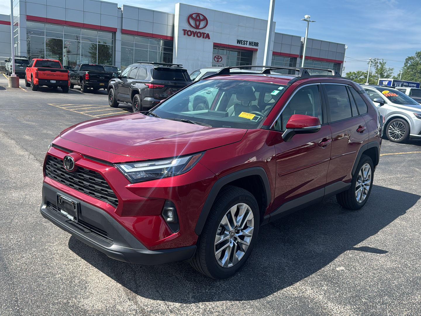 Certified Used 2024 Ruby Flare Pearl Toyota XLE Premium image 3