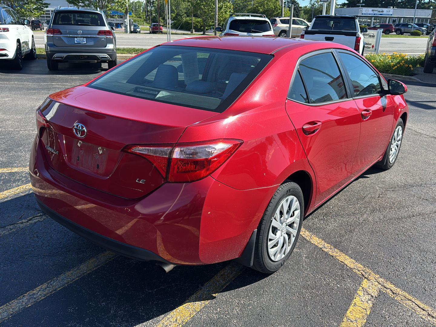 Used 2018 Barcelona Red Metallic Toyota LE image 6
