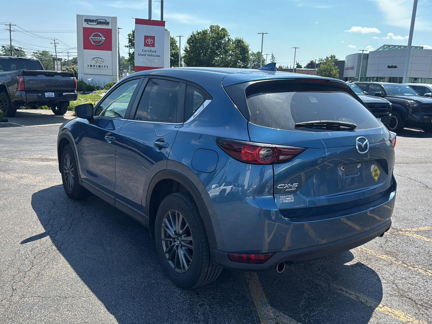 Used 2019 Eternal Blue Mica Mazda Touring image 4