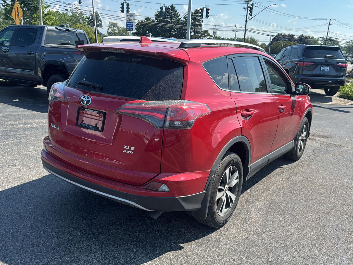 Used 2017 Barcelona Red Metallic Toyota XLE image 6