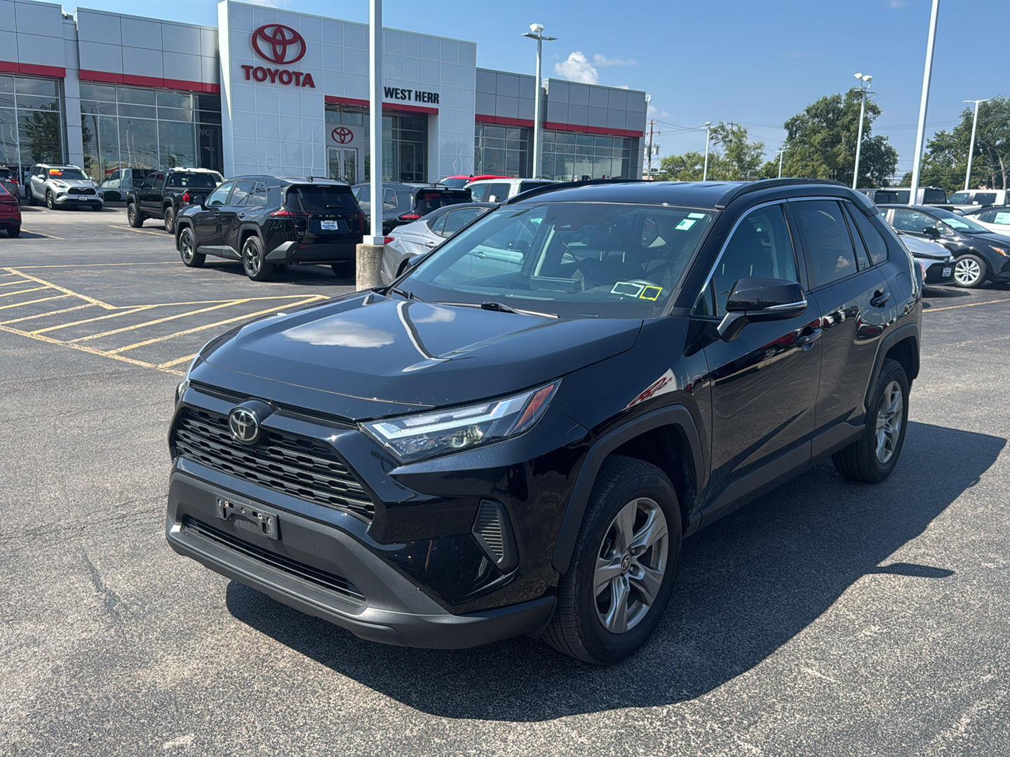 Used 2024 Midnight Black Metallic Toyota XLE image 3