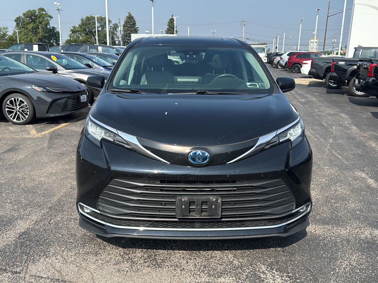 Certified Used 2023 Midnight Black Metallic Toyota XLE image 2