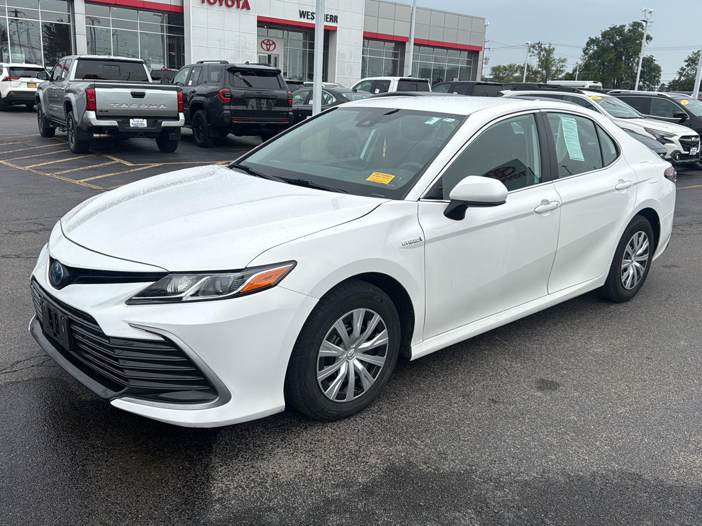 Certified Used 2021 Super White Toyota Hybrid LE image 3
