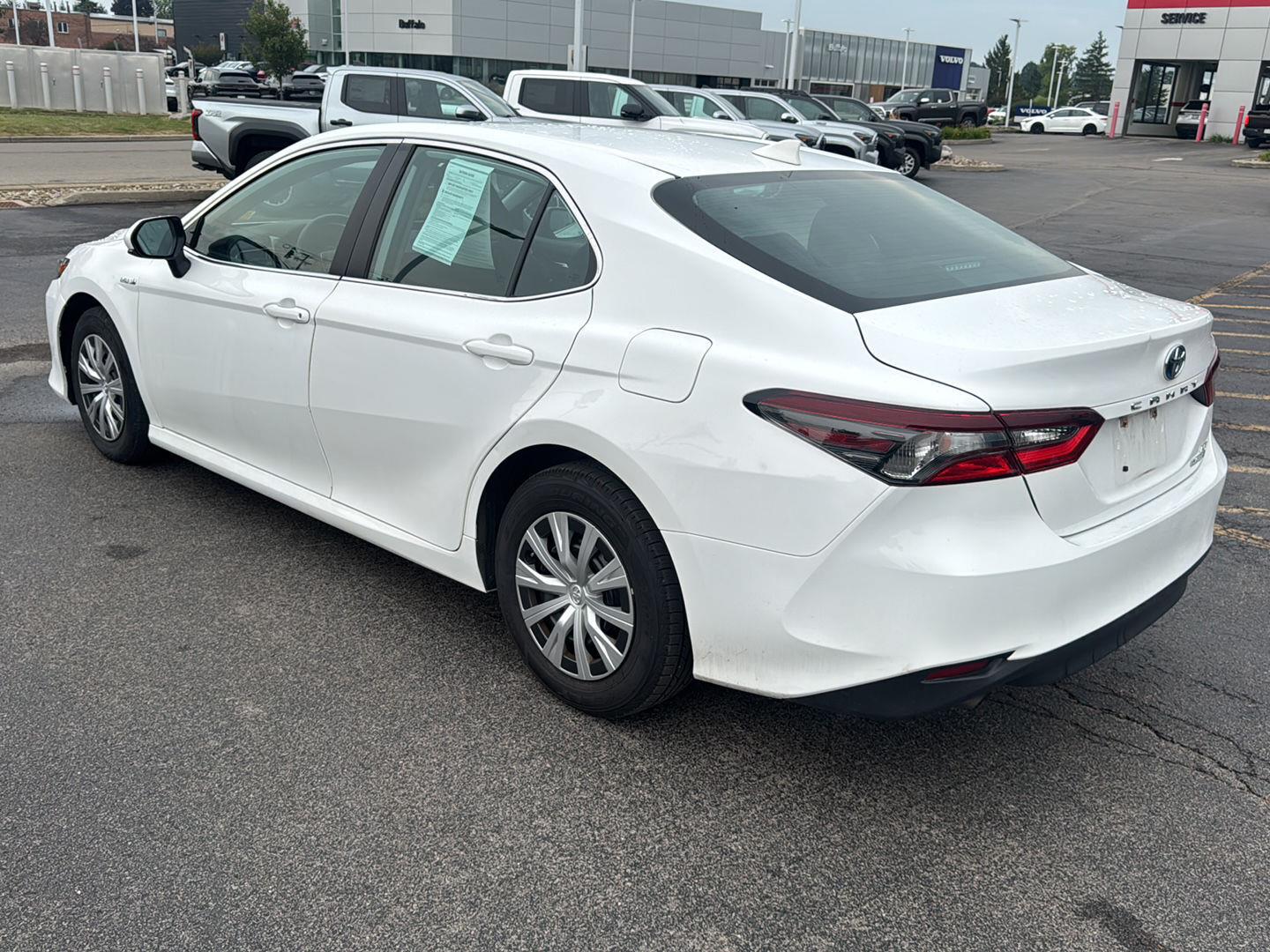 Certified Used 2021 Super White Toyota Hybrid LE image 4