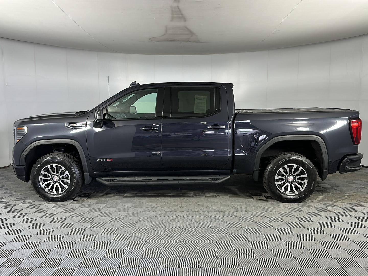 Used 2023 Titanium Rush Metallic GMC AT4 image 4