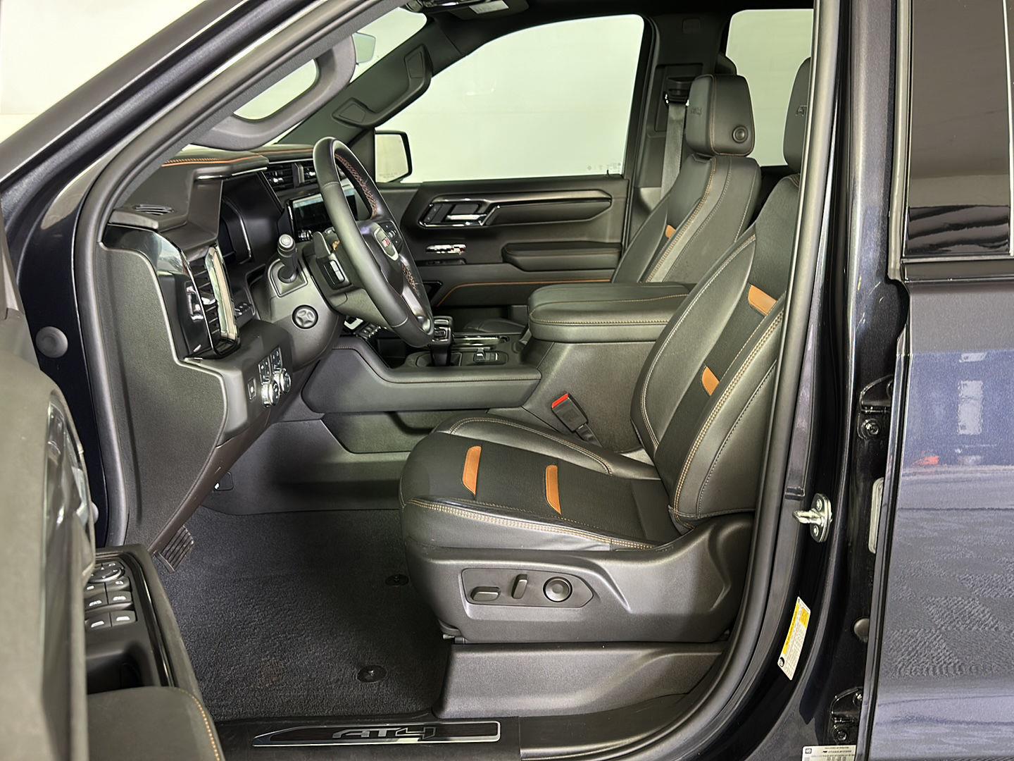 Used 2023 Titanium Rush Metallic GMC AT4 image 7