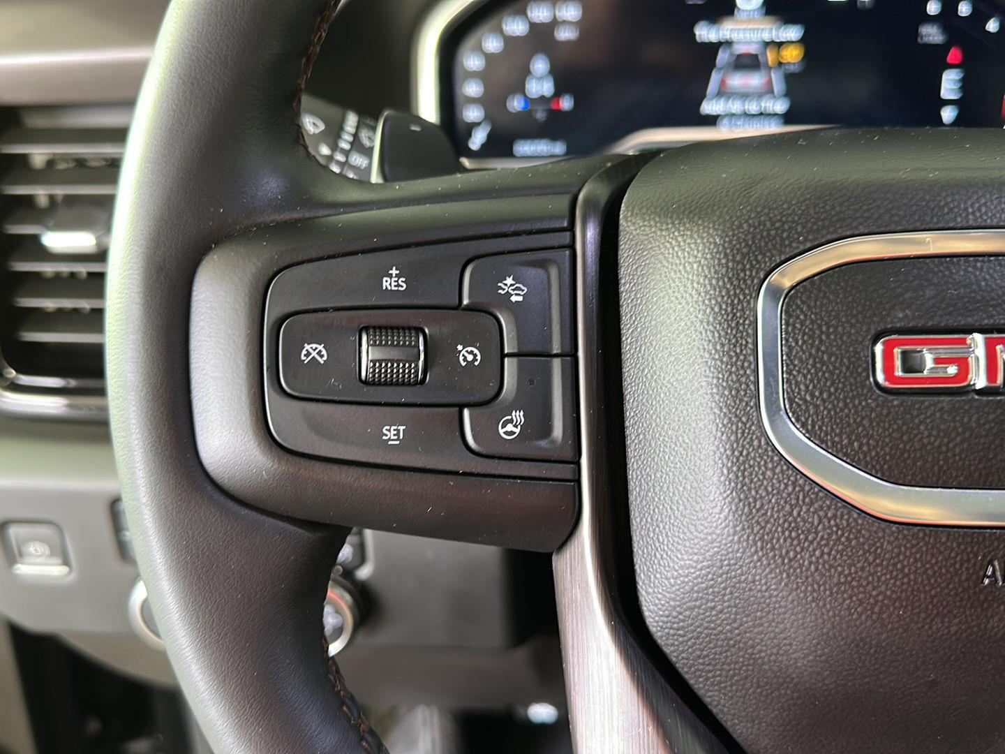 Used 2023 Titanium Rush Metallic GMC AT4 image 12