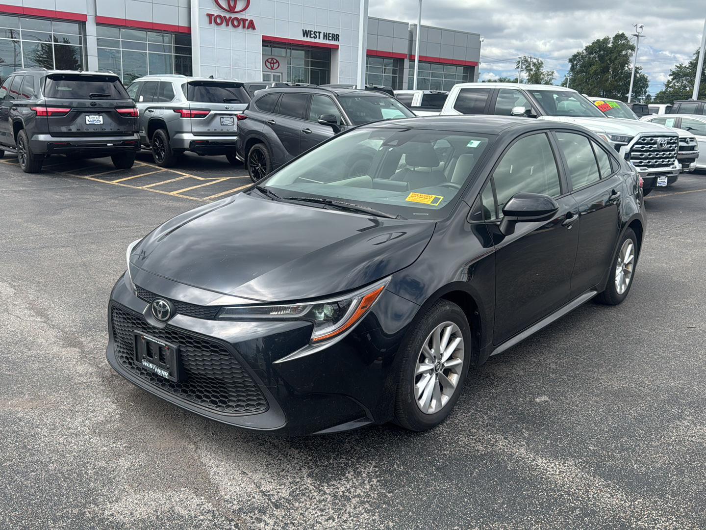 Certified Used 2021 Black Sand Pearl Toyota LE image 3